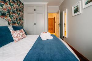 Cama o camas de una habitación en PENSIÓN CALDEA