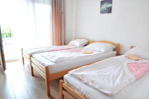 Postel nebo postele na pokoji v ubytování Hostel Room
