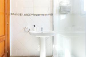 Kúpeľňa v ubytovaní Apartamento Residencial Limonar + 18 fotografií