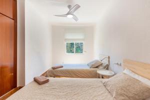 Posteľ alebo postele v izbe v ubytovaní Apartamento Residencial Limonar
