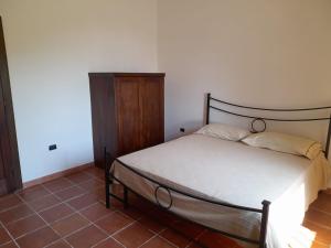 A bed or beds in a room at Villa Mattia
