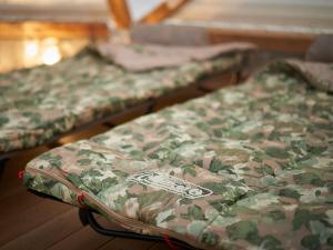 Letto o letti in una camera di Resol no Mori