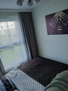 Postel nebo postele na pokoji v ubytování Apartament Letnicka, Nowy, 950m od morza
