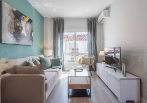 Posezení v ubytování Sunny & modern apartment - Center by REMS