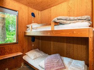 Postel nebo postele na pokoji v ubytování 6 person holiday home in Vemb