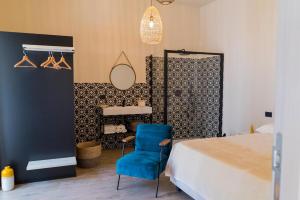 Posteľ alebo postele v izbe v ubytovaní Tesoro Nascosto B&B