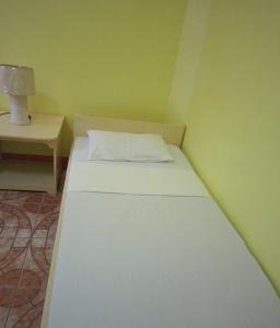 Postel nebo postele na pokoji v ubytování M&E Guesthouse
