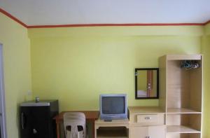 TV a/nebo společenská místnost v ubytování M&E Guesthouse