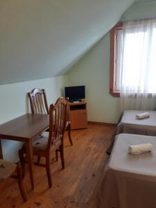 Postel nebo postele na pokoji v ubytování Hotel Premium