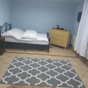 מיטה או מיטות בחדר ב-Cottage Room- Agroturystyka