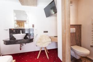 Koupelna v ubytování Haus Hrabovsky + 9 fotografií
