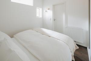 Postel nebo postele na pokoji v ubytování Haus Salz&Sand Wohnung Salz