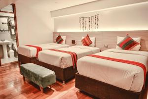 Cama ou camas em um quarto em Casa Matara Boutique
