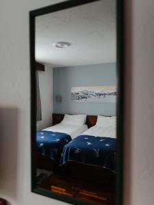 Hotel Walser Courmayeur客房内的一张或多张床位