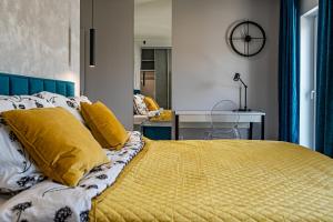 Posteľ alebo postele v izbe v ubytovaní Luksusowy apartament na Starym Miescie