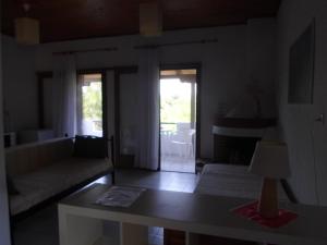 Postel nebo postele na pokoji v ubytování Bozelia Apartments