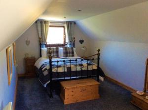 Postel nebo postele na pokoji v ubytování Bosvean Cottage