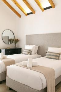 Ліжко або ліжка в номері Casa da Saudade