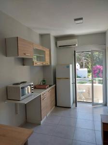 Kuchyň nebo kuchyňský kout v ubytování Old Town Harmony Apt