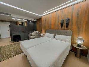 Postel nebo postele na pokoji v ubytování Gran Marina Suites
