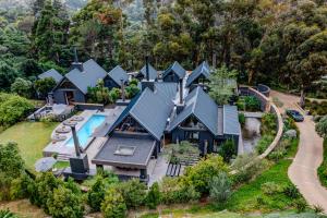 an aerial view of a house with a swimming pool at Future Found Sanctuary by NEWMARK in Cape Town