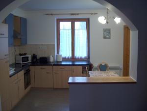 Kjøkken eller kjøkkenkrok på Almafás Vendégház Őrség