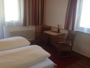 Letto o letti in una camera di Pension Bergblick