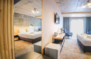 Postel nebo postele na pokoji v ubytování Hotel Posta + 37 fotografií