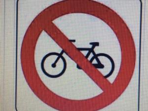 a no bikes allowed sign on a street sign at SAVOIA ROOMS in Padova