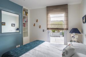 Łóżko lub łóżka w pokoju w obiekcie ILLANKA - Appartement 3 chambres avec parking et terrasse proche gare