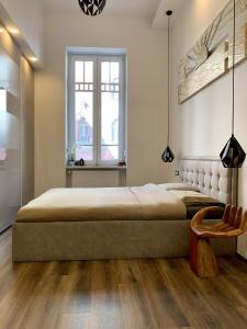 A bed or beds in a room at Vivi Residence 2