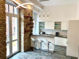 A kitchen or kitchenette at Vivi Residence 2