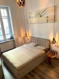 A bed or beds in a room at Vivi Residence 2