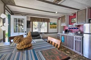 a kitchen with a table with a chicken on it at Cozy Cottonwood Gem Patio and 180-Degree Views in Cottonwood