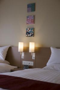Postel nebo postele na pokoji v ubytování Miyako Hotel Yokkaichi