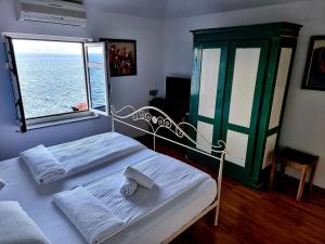 Postel nebo postele na pokoji v ubytování VILLA BISER