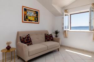 Ruang duduk di Apartments Paloc - Orange