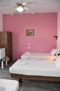 Letto o letti in una camera di Metapontis Studios (Nimporio)