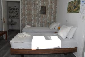 Letto o letti in una camera di Metapontis Studios (Nimporio)