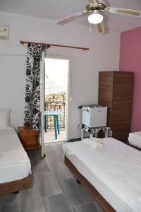 Letto o letti in una camera di Metapontis Studios (Nimporio)