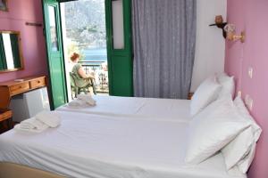 Letto o letti in una camera di Metapontis Studios (Nimporio)