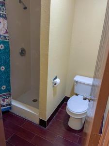 A bathroom at Deluxe Inn & Suites