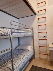a bunk bed room with two bunk beds at EN EL CASCO HISTORICO De SANTA CRUZ in Santa Cruz de Tenerife