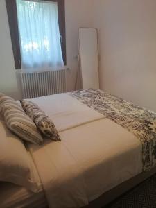 Postel nebo postele na pokoji v ubytování Casa MI-RE-LA