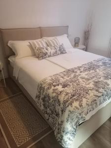Postel nebo postele na pokoji v ubytování Casa MI-RE-LA