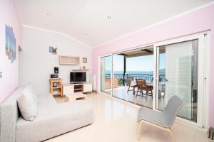 Posezení v ubytování Apartments Oriana