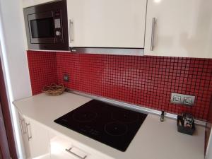Kuchyňa alebo kuchynka v ubytovaní Apartamento Puerta del Arenal - Kainga Homes