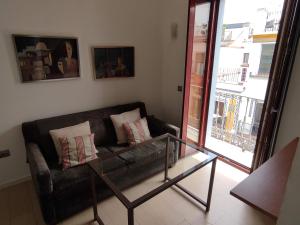Posedenie v ubytovaní Apartamento Puerta del Arenal - Kainga Homes