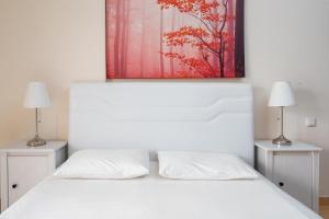 Postel nebo postele na pokoji v ubytování Villa Dias