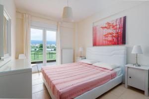 Postel nebo postele na pokoji v ubytování Villa Dias